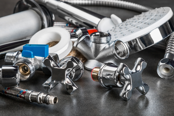 The Drain Man plumber repairing a residential plumbing connection in Talbott, TN