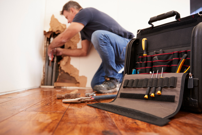 The Drain Man technician performing emergency plumbing repair in Sevierville, TN