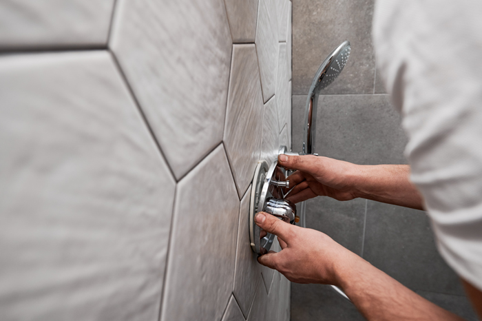 The Drain Man technician performing emergency plumbing repair in Dandridge, TN