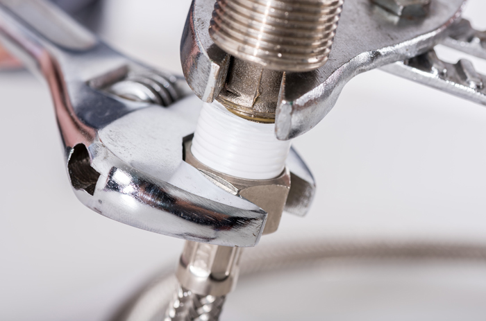 The Drain Man technician performing emergency plumbing repair in Jefferson City, TN